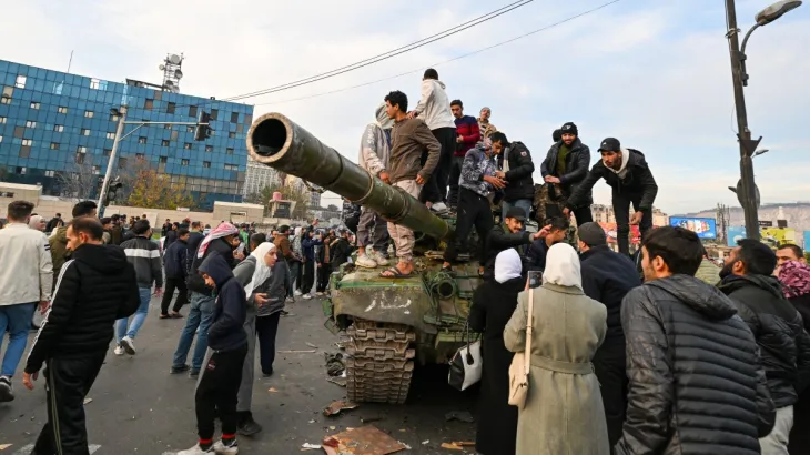 AFP__20241208__36PV6JX__v2__Preview__TopshotSyriaConflict-1733637634